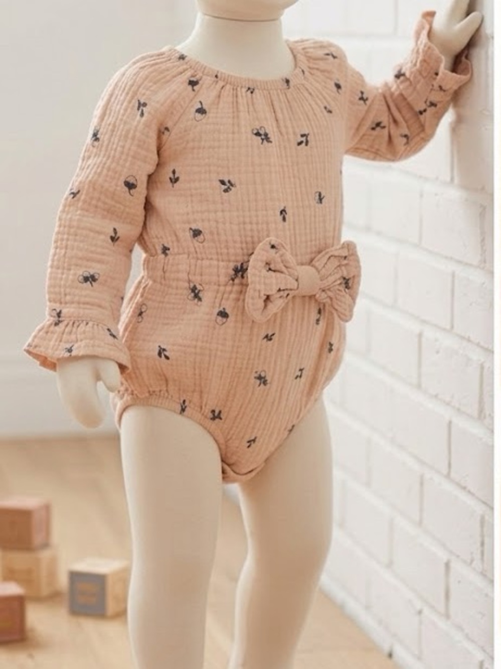 Beige Floral-Print Baby Romper with Front Bow